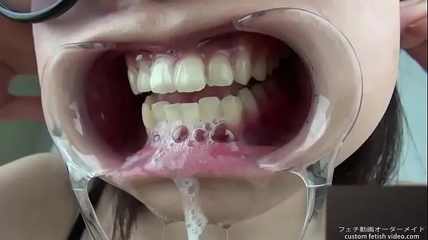 สด A woman shows her gums and sputs saliva ไดรฟ์ Tube