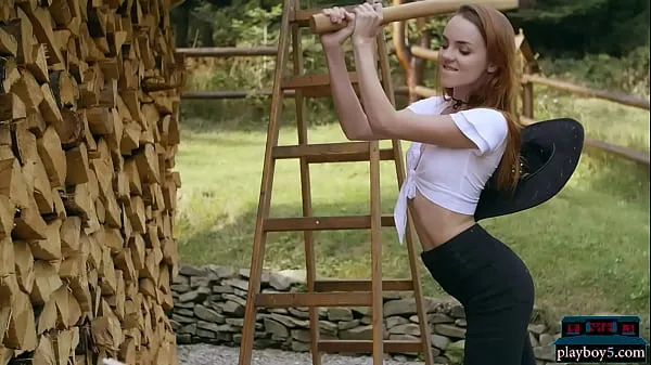 أنبوب محرك Tiny teen Playboy model Kate Great strips naked outdoor chopping wood جديد